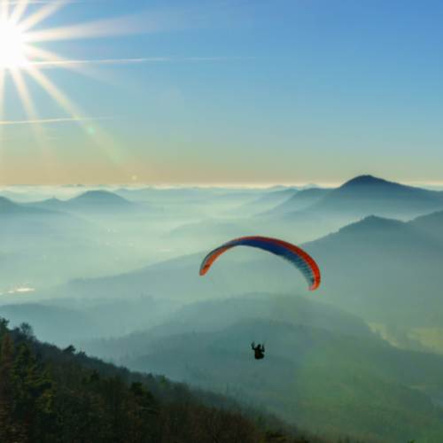 Paraglider over the alps