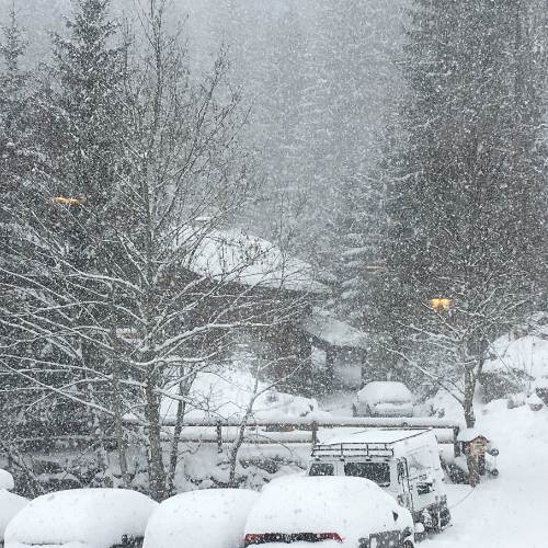 Parking Taxis and Buses In St Jean d'Aulps - snow-covered cars